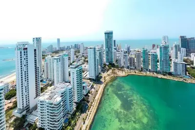 an aerial view of a city with buildings and a body of water at MR1-1G APARTAMENTO BASICO CERCA AL MAR CON AIRE ACONDICIONADO Y WIFi PARA 4 PERSONAS in Cartagena de Indias