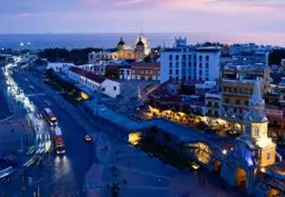 a view of a city at night with lights at MR1-2G APARTAMENTO BASICO CERCA AL MAR CON AIRE ACONDICIONADO Y WIFi PARA 4 PERSONAS in Cartagena de Indias
