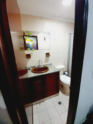 a bathroom with a sink and a toilet at CASA ZOE in Cartagena de Indias