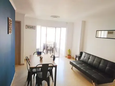 a living room with a couch and a table at Espectacular Apartamento cerca al centro Histórico in Cartagena de Indias