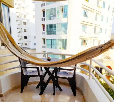 a hammock on the balcony of a apartment at Espectacular Apartamento cerca al centro Histórico in Cartagena de Indias
