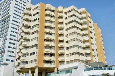 a tall building with balconies on the side of it at Espectacular Apartamento cerca al centro Histórico in Cartagena de Indias