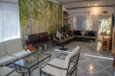 a living room with couches and a table at L' Europe in Isla Fuerte