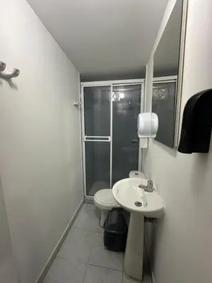 a bathroom with a toilet and a sink at Apartamento in Cartagena de Indias
