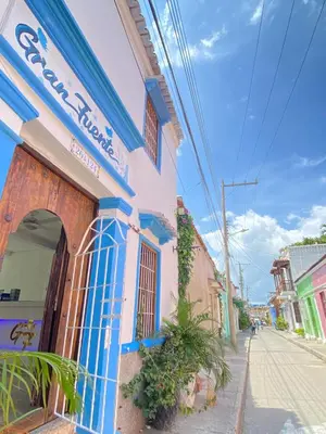 a building on the side of a street at Casa Gran Fuente in Cartagena de Indias