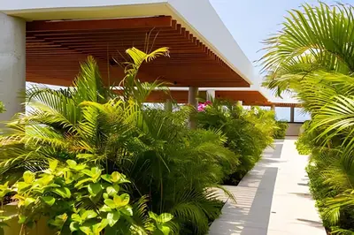 a garden of plants in front of a building at 1 Dormitorio Cielo Mar. Jacuzzi Privado in Cartagena de Indias
