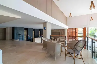 an open living room with a table and chairs at 1 Dormitorio Cielo Mar. Jacuzzi Privado in Cartagena de Indias