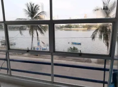 a window with a view of a body of water at Loft facing the sea MR1-2G upper class neighborhood in Cartagena de Indias