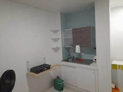 a small kitchen with a sink and a counter at Apartaestudio Cartagena in Cartagena de Indias