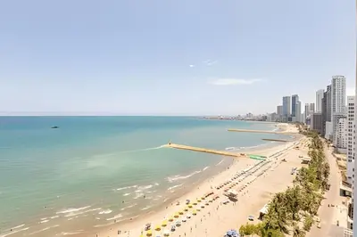 a view of a beach with buildings and the ocean at Laurdhomes Palmetto Beach Sew View, Hot Water in Cartagena de Indias