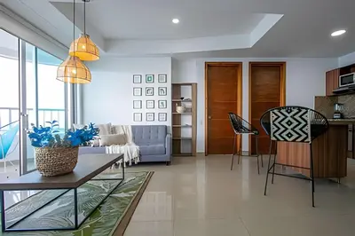 a living room with a couch and a table at LaurdHomes Palmetto Sea View, 2Rooms 2BTH Hot Ware in Cartagena de Indias