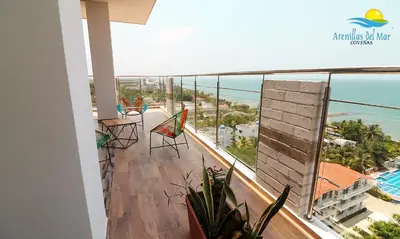 a balcony with a view of the ocean at Arenillas del Mar in Tolú