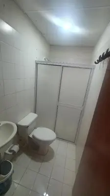 a bathroom with a toilet and a sink at Casa de descanso Cartagena-Turbaco in Turbaco