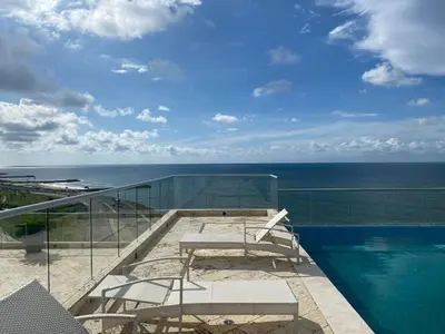 a balcony with a view of the ocean at Sunny House in Cartagena de Indias