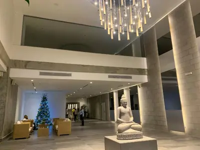 a christmas tree in the lobby of a building at Oceanview Escape Pool, Jacuzzi & Gym in Bocagrande in Cartagena de Indias