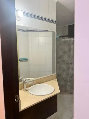 a bathroom with a sink and a shower at Espetacular vista mar y playa in Cartagena de Indias