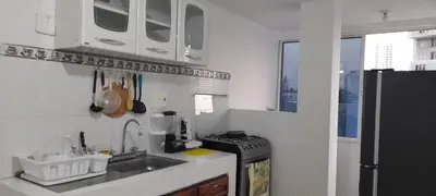 a kitchen with a sink and a stove and a refrigerator at Hogar dulce hogar in Cartagena de Indias