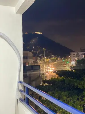 a view of a city at night from a balcony at Hogar dulce hogar in Cartagena de Indias