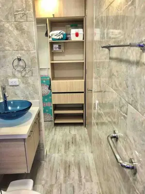 a bathroom with a sink and a glass shower at apartamento en bocagrande in Cartagena de Indias