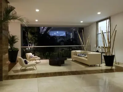 a living room with two couches and two chairs at Espectacular apartamento Morros Epic Cartagena, Acceso directo a la playa in Cartagena de Indias