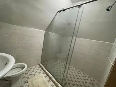 a bathroom with a shower and a toilet at Cabaña Yalis SAS in Cartagena de Indias