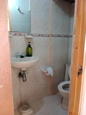 a bathroom with a sink and a toilet at Apartamento Excelente Ubicación Cartagena - Nuevo Bosque - Seguridad in Cartagena de Indias