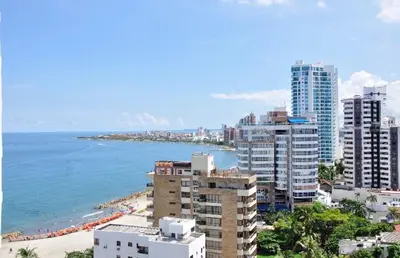 a view of a beach and buildings and the ocean at II-Nice and cozy 2 bedroom Apt BOCAGRANDE in Cartagena de Indias