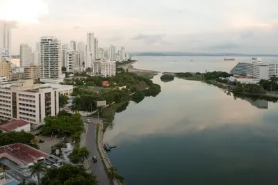 a view of a city with a river and buildings at I-Nice 1 Bedroom Apt Laguito in Cartagena de Indias