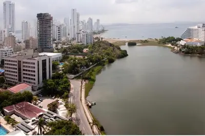 an aerial view of a city with a large body of water at I-Nice 1 Bedroom Apt Laguito in Cartagena de Indias