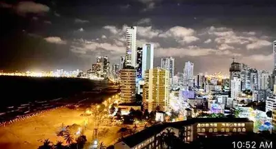 a view of a city at night with lights at I-Nice 1 Bedroom Apt Laguito in Cartagena de Indias