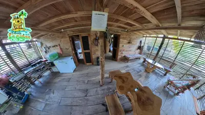 an overhead view of the inside of a wooden cabin at LA GAITERA Cabaña in Moñitos