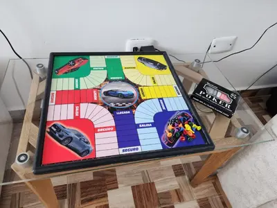 a tablet on a table with toys on it at Lujoso apartamento amoblado en Coveñas cerca a la playa in Coveñas