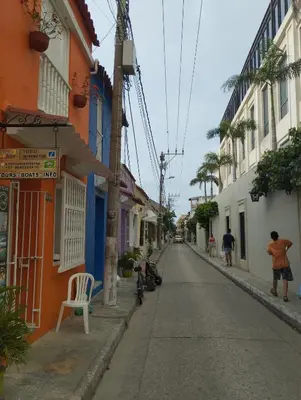 an empty street in a city with buildings at Casa 39-33 in Cartagena de Indias