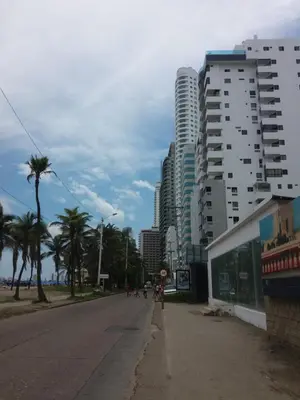 an empty street in a city with tall buildings at Vista Playa in Cartagena de Indias
