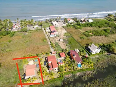 an aerial view of a house on the beach at El ensueño in San Bernardo del Viento