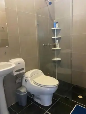 a bathroom with a toilet and a sink and a shower at Ubicación increíble! cerca del centro y del mar in Cartagena de Indias