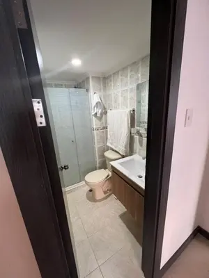 a bathroom with a toilet and a sink at Apartamento Vacacional Cartagena in Cartagena de Indias