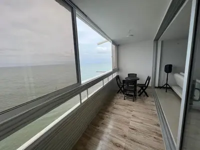 an empty room with a view of the ocean at Apartamento Vacacional Cartagena in Cartagena de Indias