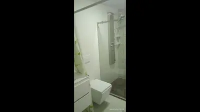 a bathroom with a toilet and a shower at Modern Duplex Balcony Sea View Mr8 in Cartagena de Indias