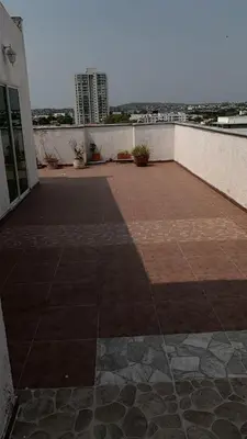 a large patio with a view of a building at Bonito apartamento en Cartagena con garaje gratuito in Cartagena de Indias