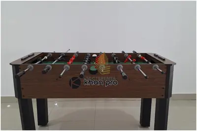 a large wooden table with a display of weapons at Edificio NUEVO DE LUJO CARTAGENA BOCAGRANDE in Cartagena de Indias