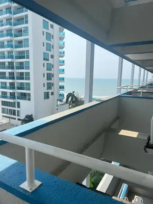 a balcony with a view of the ocean from a building at Lindo Apartamento cerca al mar in Cartagena de Indias
