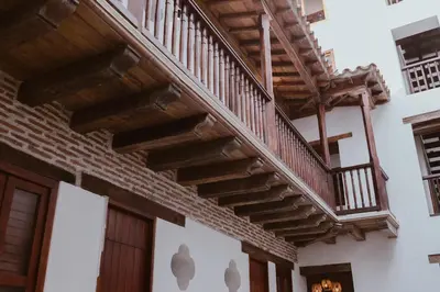 a wooden staircase on the side of a building at Hotel Voilá Getsemaní in Cartagena de Indias