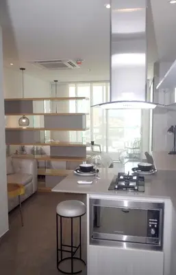 a kitchen with a stove and a counter top at Las Margaritas, Loft en Distrito 90 in Barranquilla