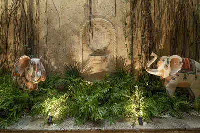 a group of statues of elephants in a garden at Privado Designer Boutique Hotel in Cartagena de Indias