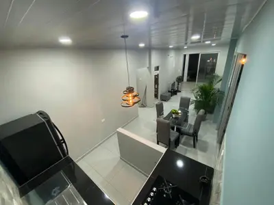 a view of a living room with a dining room at APARTAMENTOS AMOBLADOS in Santa Marta