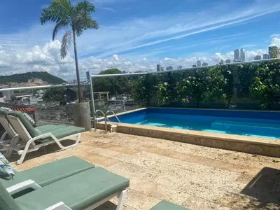 a swimming pool on the roof of a building at Casa Ebano 967 in Cartagena de Indias
