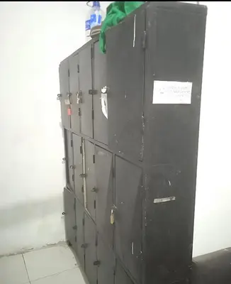 a group of gray cabinets stacked on top of each other at Hostal #10-33 in Cartagena de Indias