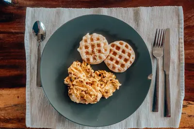 a plate of food with waffles and waffle at Casa Mambo Salinas in Santa Veronica