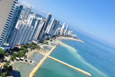 an aerial view of a beach in front of a city at Lujoso apartamento Boca grande Condominio H2 in Cartagena de Indias